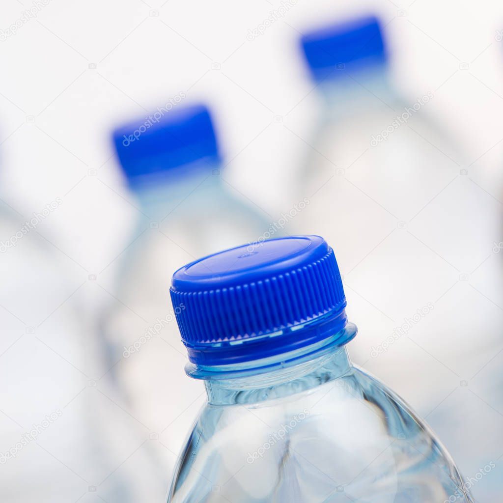 Plastic bottles of water isolated on white background