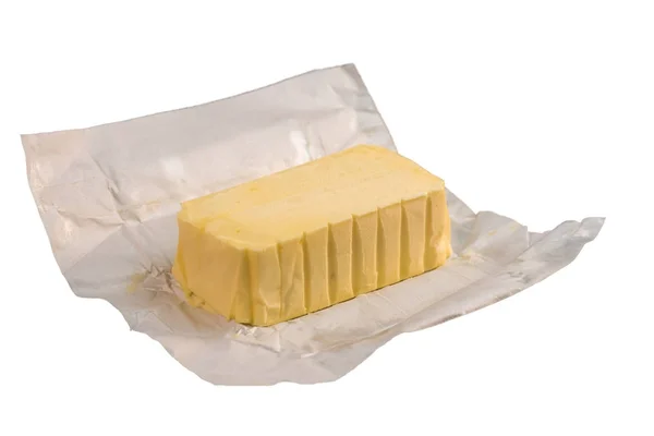 Platta av smör inslagning redo att äta — Stockfoto