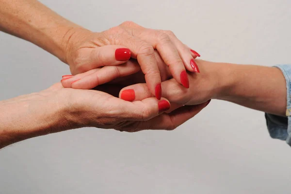 Hands of Senior mother and daughter — Stock Photo, Image