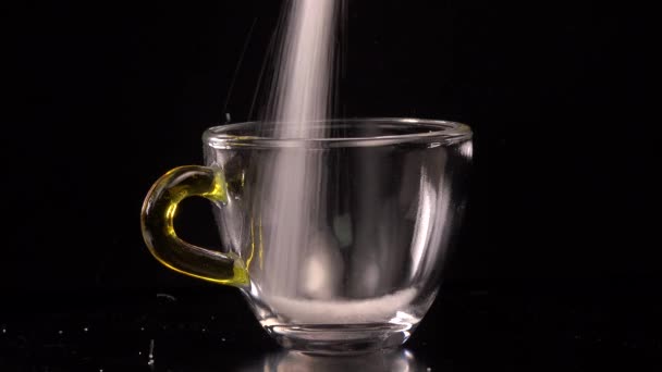 Pouring lot of Sugar in coffee cup — Stock Video