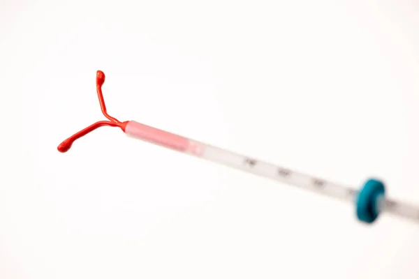 Doğum kontrol sembolü, IUD doğum kontrol, sorumlu cinsel eğitim — Stok fotoğraf