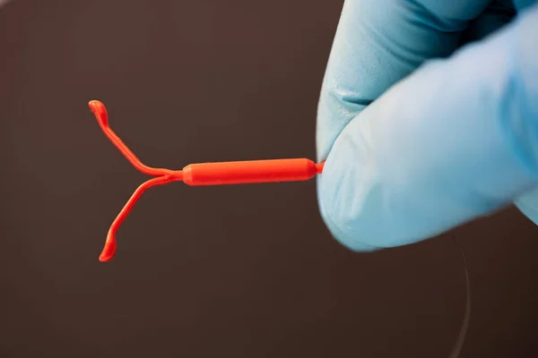 Fruchtbarkeitskontrollsymbol, IUD-Verhütung, Sexualerziehung mit Verantwortung — Stockfoto
