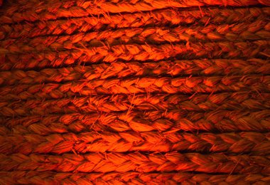 Saman ipiyle yapılan renkli kırmızı soyut arkaplan