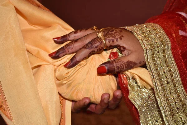 Close up of Asian couple's hands at a wedding, concept of marriage, partnership, commitment — 스톡 사진