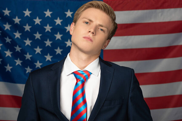 serious man on american flag background