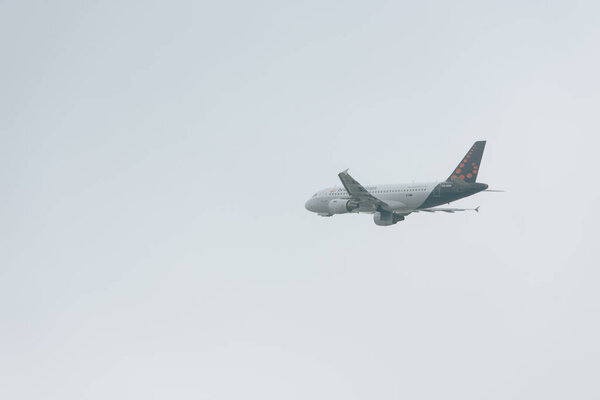 KYIV, UKRAINE - OCTOBER 21, 2019: Jet plane of brussels airlines taking off in cloudy sky