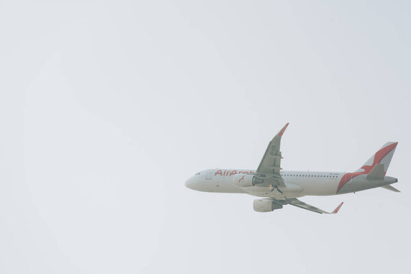 KYIV, UKRAINE - OCTOBER 21, 2019: Commercial plane of air arabia airline in cloudy sky