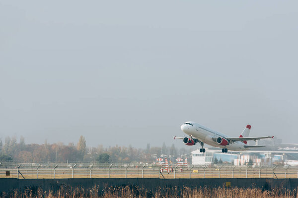Flight departure of airplane on airport runway