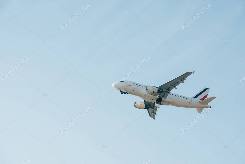 Low Angle View Of Flight Departure Of Airplane In Clear Sky Larastock