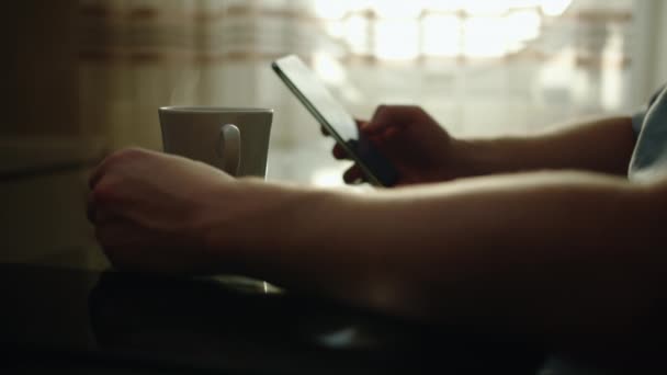 Men Hands Sits Glass Table Drinks Coffee Uses Mobile Phone — Stock Video