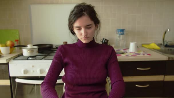 Pale Sad Young Girl Sitting Table Blurred Background Kitchen — Stock Video