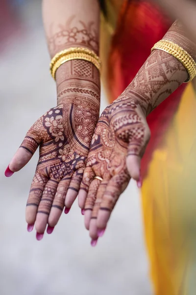 Bengali marriage rituals with beautiful decoration of hand with