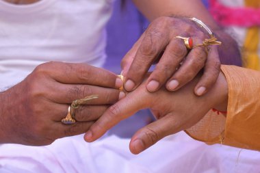 Colourful traditional view of bengali wedding rituals while grro