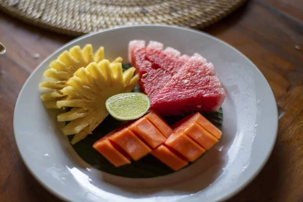 Juicy yummy Organic watermelon, papaya, pineapple pieces in a de