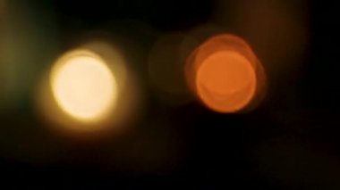 Mum ışığı siyah arkaplanı bokeh