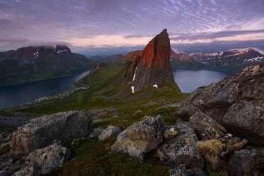 White nights in the fjords of Norway, Segla mountain, Senja island clipart