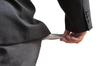 İflas etmiş işadamı pantolonunun cebini boşaltıyor. Dünya ekonomik krizi kavramı. Beyaz arka planda izole edilmiş. Yatay çekim.