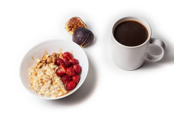 Breakfast oatmeal porridge with fruits berries and coffee cup. Healthy breakfast concept — Stock Photo, Image