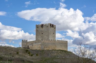 Castle of Tiedra village in the province of Valladolid Spain on a sunny winter day clipart