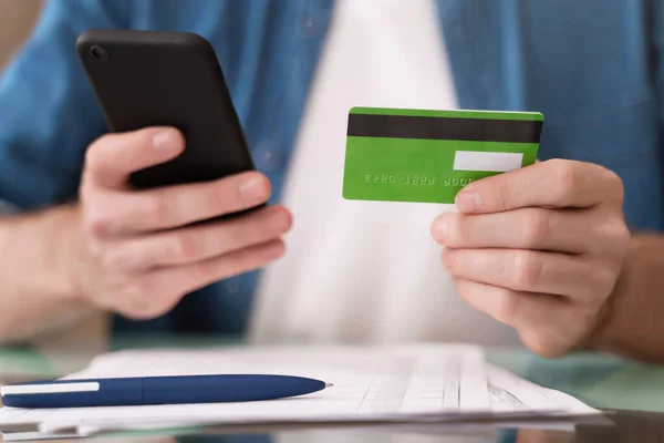 Young Caucasian Man Paying Bills Online Smartphone Home Closeup Man — Stock Photo, Image