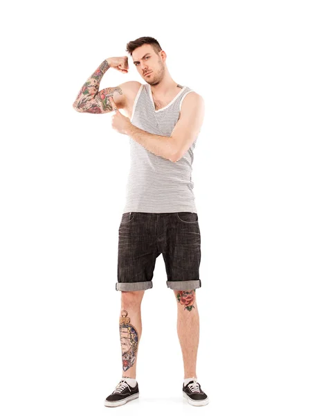 Hombre fuerte con tatuaje — Foto de Stock