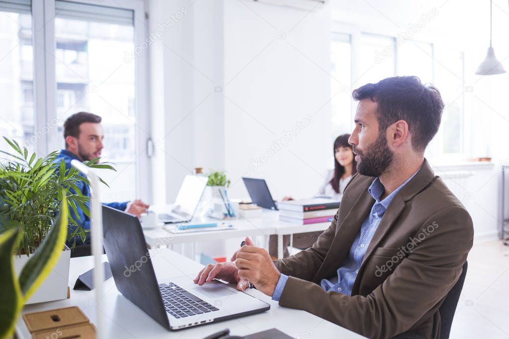 Businesspeople Working in Office