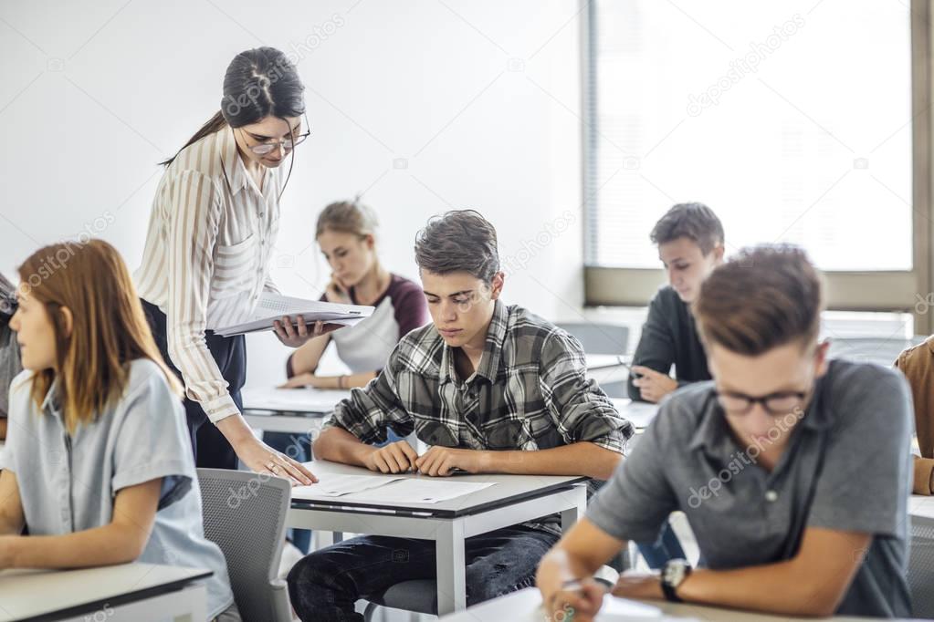 Teacher Giving Out Exam