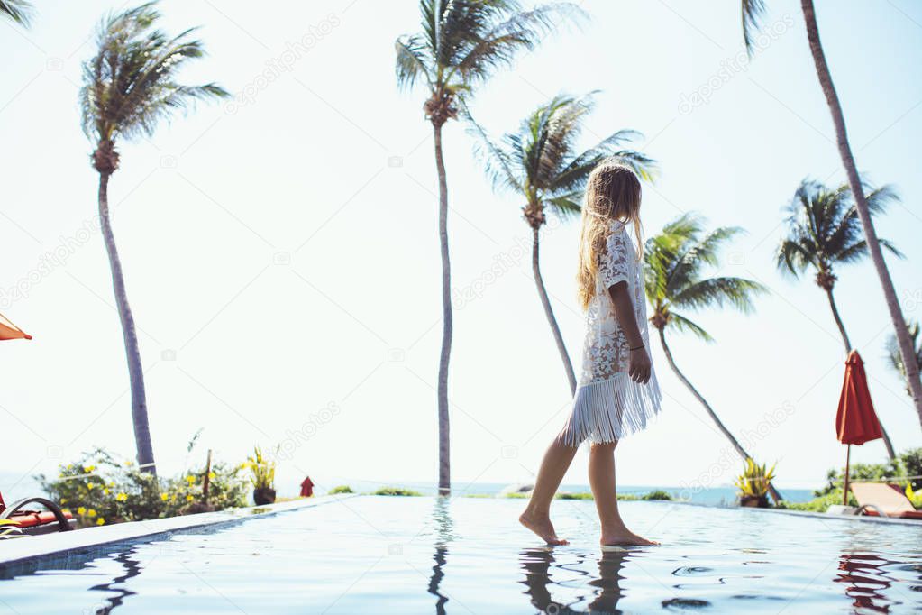 Woman Enjoying Summertime at Exotic Resort