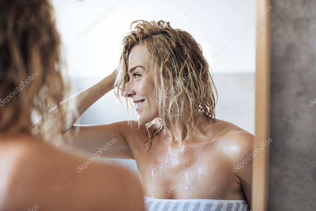 Woman Looking at Mirror