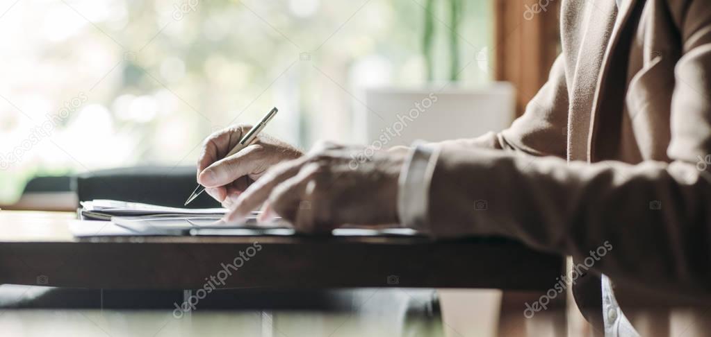 Elegant Businessman Writing