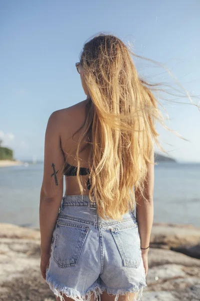 Woman Vacationer Enjoying Summertime By the Sea