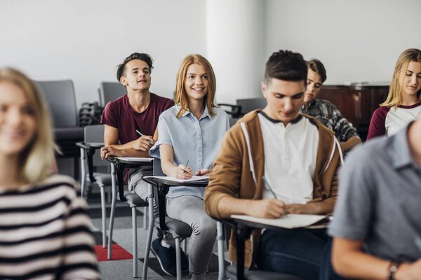 Students Taking Notes at Class