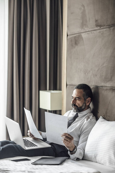 Businessman Working at Hotel Room