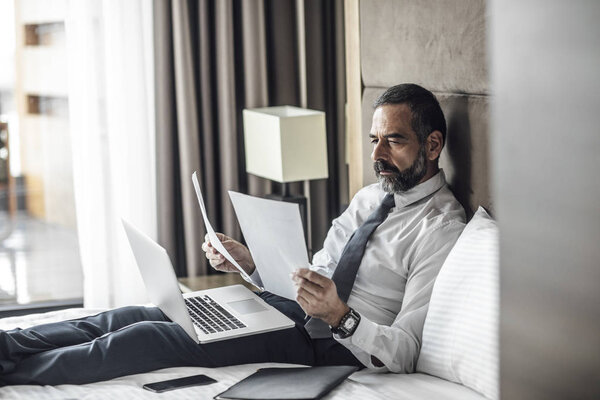 Businessman Working at Hotel Room