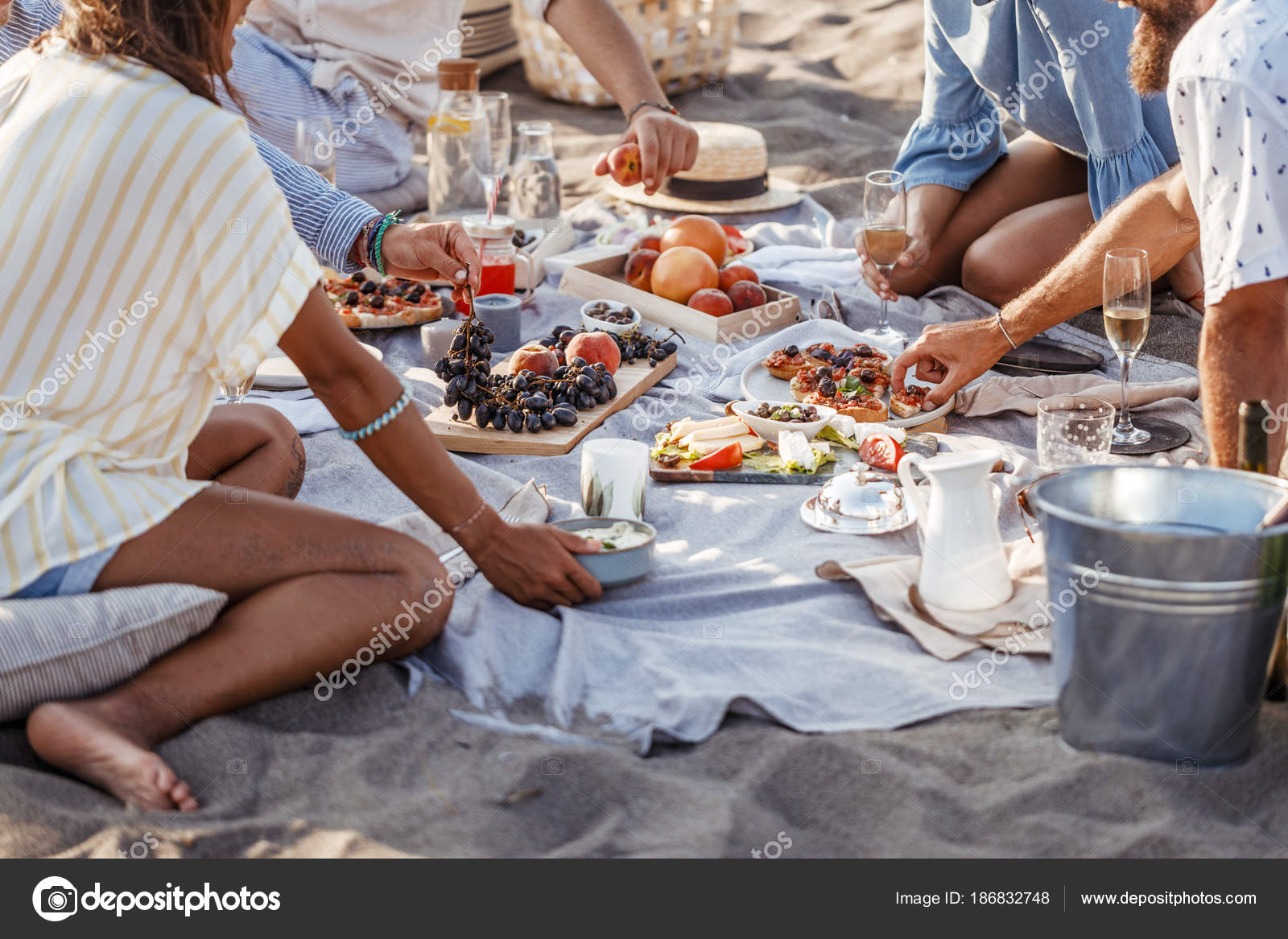 People Enjoying Food on Beach Picnic — Stock Photo © luminastock #186832748