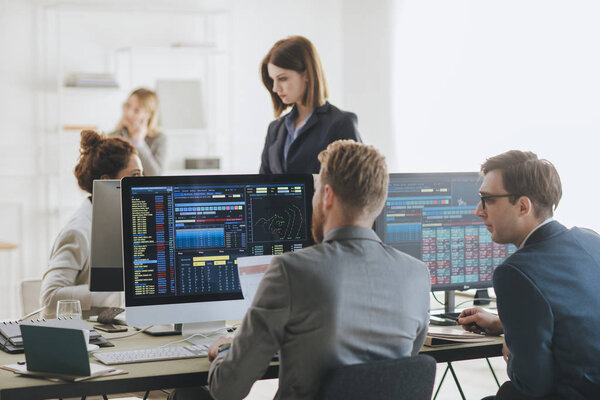 Group of brokers Working Together Stock Photo