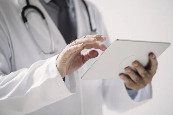 A Doctor Holding Tablet