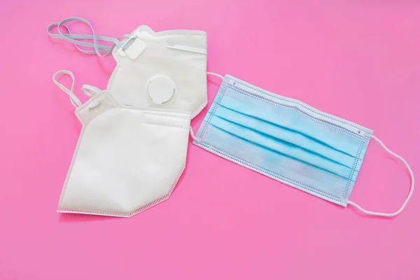 Surgical mask with rubber ear straps. Typical 3-ply surgical mask, masks pff2 and pff3 against covid.