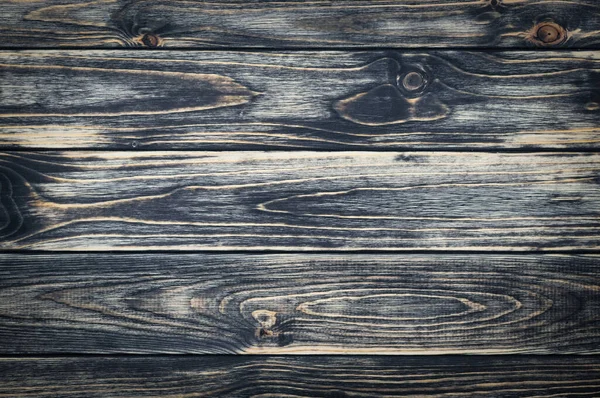 Yatay siyah tahta tahtaların doğal arka planı — Stok fotoğraf
