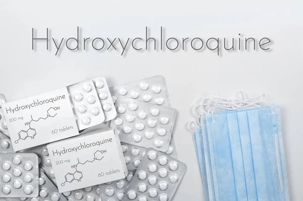 Hydroxychloroquine Possible Treatment Coronavirus Concept Tablets Boxes Blister Medical Masks — Stock Photo, Image