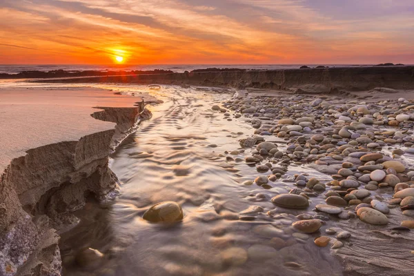 Red sunset at beach — Stock Photo, Image