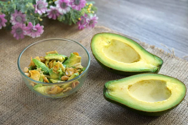 healthy breakfast menu, avocado mixed with peanut and condensed milk   served on table top