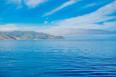 Blue sky and white clouds on the sea