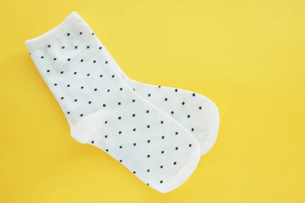 Pair White Black Speckled Cotton Socks Bright Yellow Background Space — Stock Photo, Image