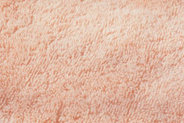 Soyut arka plan ve pembe kumaş dokusu. Parlak gün ışığı ve gölgeler.