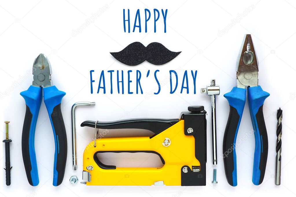 postcard of happy father's day. yellow lettering, black shiny mustache and tools for construction and repai