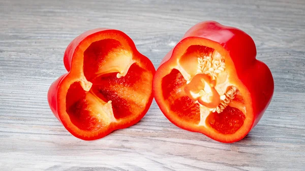 stock image Red Bell pepper cut in half exposing the seeds