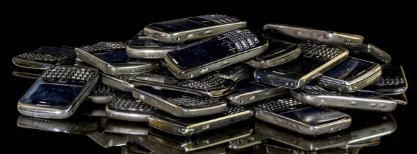 Old smart phones in a pile ready for recycle — Stock Photo, Image