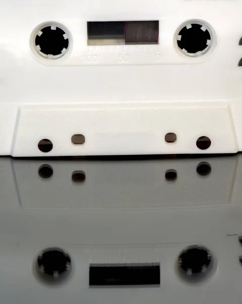Cassette tape in awhite case — Stock Photo, Image