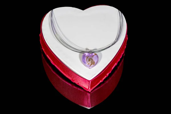 Jewelry on a valentine candy box — Stock Photo, Image